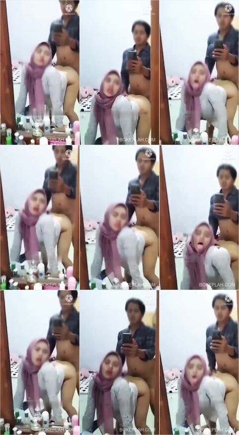 Thumbnail Video Sex HIJAB DOGGY STYLE DEPAN KACA Bahan Lokal